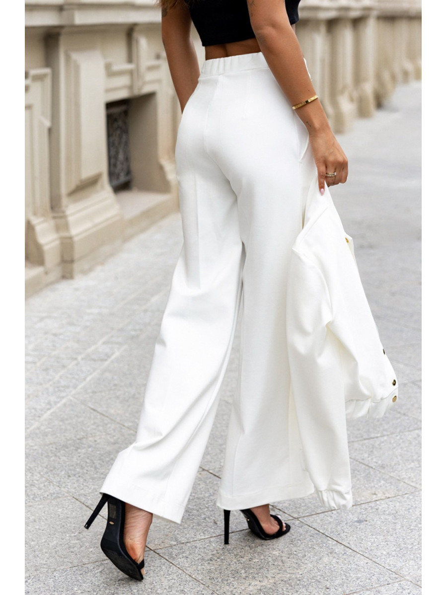 Spodnie jinny z prostymi nogawkami w kant